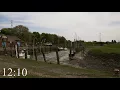 Van eb naar vloed in een korte timelapse