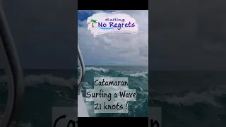 Catamaran Surfing a Wave 21 Knots