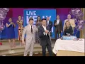Ryan Seacrest Passes His Mug to Mark Consuelos