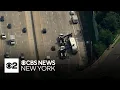 Tractor trailer strikes overpass and overturns on NYS Thruway in Rockland County