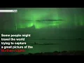Whales play under the Northern Lights in Norway - BBC News