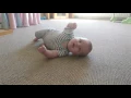 Baby rolling over, milking it for the camera