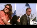 Jennifer Carpenter takes her boot and black sock off