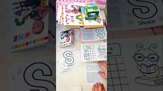 Making personalized coloring books for a 1st birt ay party