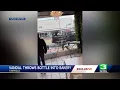 shows man throw bottle through window of Fairfield business