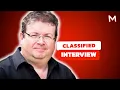 Classified Director Roel Reine Details the Action Workout He Gave Aaron Eckhart Abigail Breslin