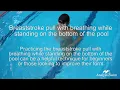 Breaststroke pull with breathing while standing on the bottom of the pool