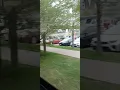 Greyhound Bus Leaving St Paul Minnesota for Madison Wisconsin and BNSF Train also Leaving St Paul