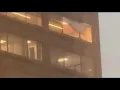 LOOK Storm damages window near Anthony J Celebrezze Federal Building in Cleveland