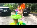Savannah and Daddy Pretend Play With The Magic Flower Water Table
