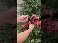 A simple way to decorate your Christmas tree this year using ribbon