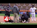 Detroit Tigers groundskeeper flips off camera while being attended to by medical staff