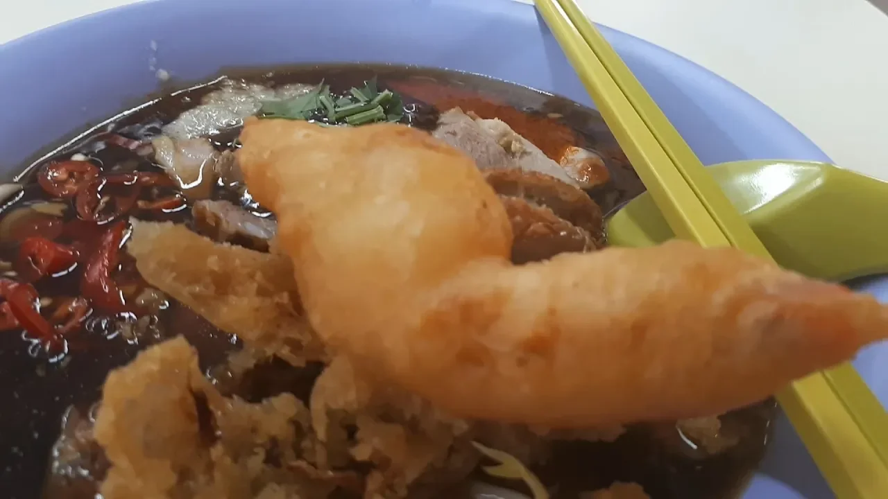 Bedok North Street 3 Block 511 Food Centre. Seng Kee Black Herbal Chicken Soup. 511 Lor Mee