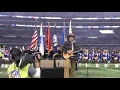 Ted playing national anthem at the Dallas Cowboys game.