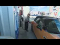 AAA says the national average for gas could fall to 3 per gallon