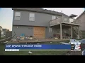 Car goes through house in Smithville