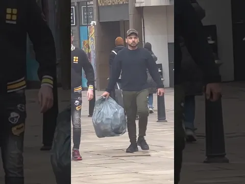 Holding them garbage bin bag😁