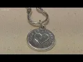 Jewelry store inspired by patrons adoption stories to create new charm