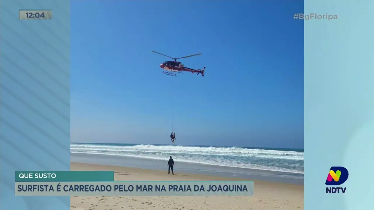 Surfista é carregado pelo mar na praia da Joaquina