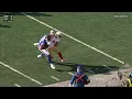 Theo Johnson fights his way to the endzone for the touc own