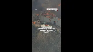 Fast-moving brushfire torches homes in Simi Valley