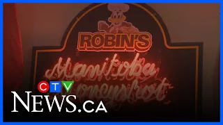 Winnipeg man showcases Robin s Donuts collection