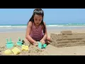 Download Lagu Watch this girl build this amazing sand castle!