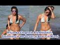 Priyanka Chopra in Printed Bikini Swimming in the Ocean at Beach in Miami
