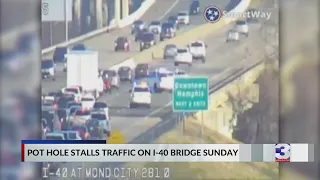 Pothole stalls traffic on I-40 bridge