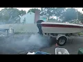 Mercury 90HP 2-cycle smoking out the neighborhood