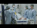 Turning a patient from supine to the prone position - Passive floor lift