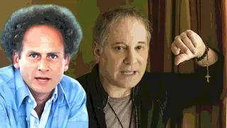 Simon Garfunkel like big butts