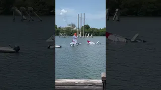 Lisa laughing at 2 Sailing dinghies flipping, while she does laundry #shorts  #laundryday  #sailing