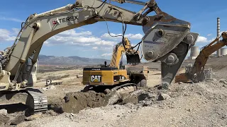 Three Excavators Working Side by Side Breaking Rock and Loading Dumpers - Sotiriadis/Labrianidis