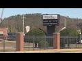 Student arrested accused of firing gunshots at car and hiding guns at school