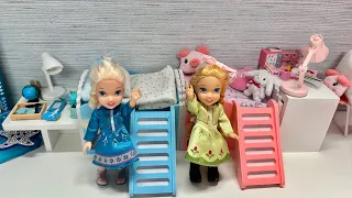 Elsa and Anna toddlers tidy up their room