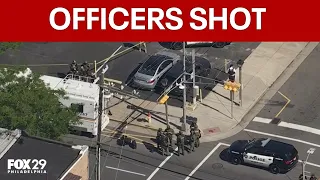 2 police officers injured suspect killed in atlantic city shooting officials