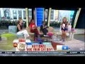 Lara Spencer - leggy in a blue dress and heels