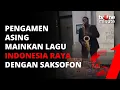 Download Lagu KEREN! Pengamen Asing Ini Nyanyikan Lagu Indonesia Raya Pakai Saksofon | tvOne