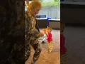 Rod Stewart enjoying his grandchild