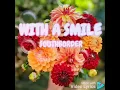 With A Smile - South border