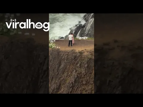 Stranger’s Cliffside Proposal Caught on Camera || ViralHog