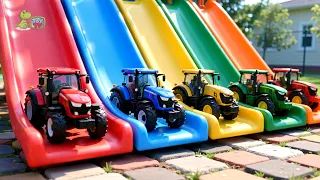 Toy Tractors Go Down the Slide into a Giant Paint Pool! 🔴🔵🟡🟢🟠