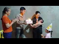 A happy moment Vu and the single mother celebrate together as the baby turns one month old