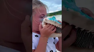 #boatlife #sailingfamily #familyadventure Little Girl Blows Conch Shell at Sunset 🥹🌴