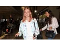 EXCLUSIVE - Elle Fanning Shows New Rose Hair Color Jetting Out Of LAX