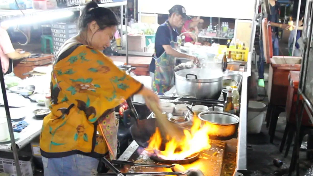 Thai Street Food: Our Dinner Tonight. Eating Street Food at a Night Market in Thailand.