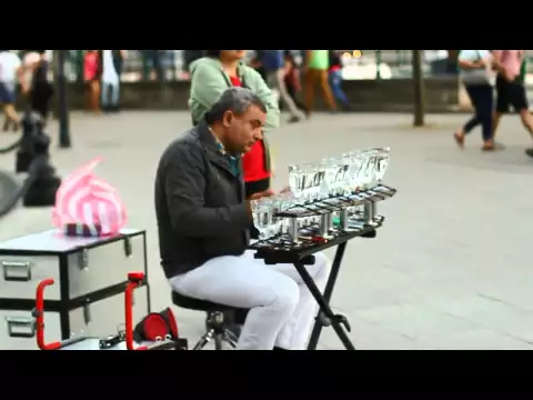 Download MP3 Popcorn song :  Music with glasses by A Street performer