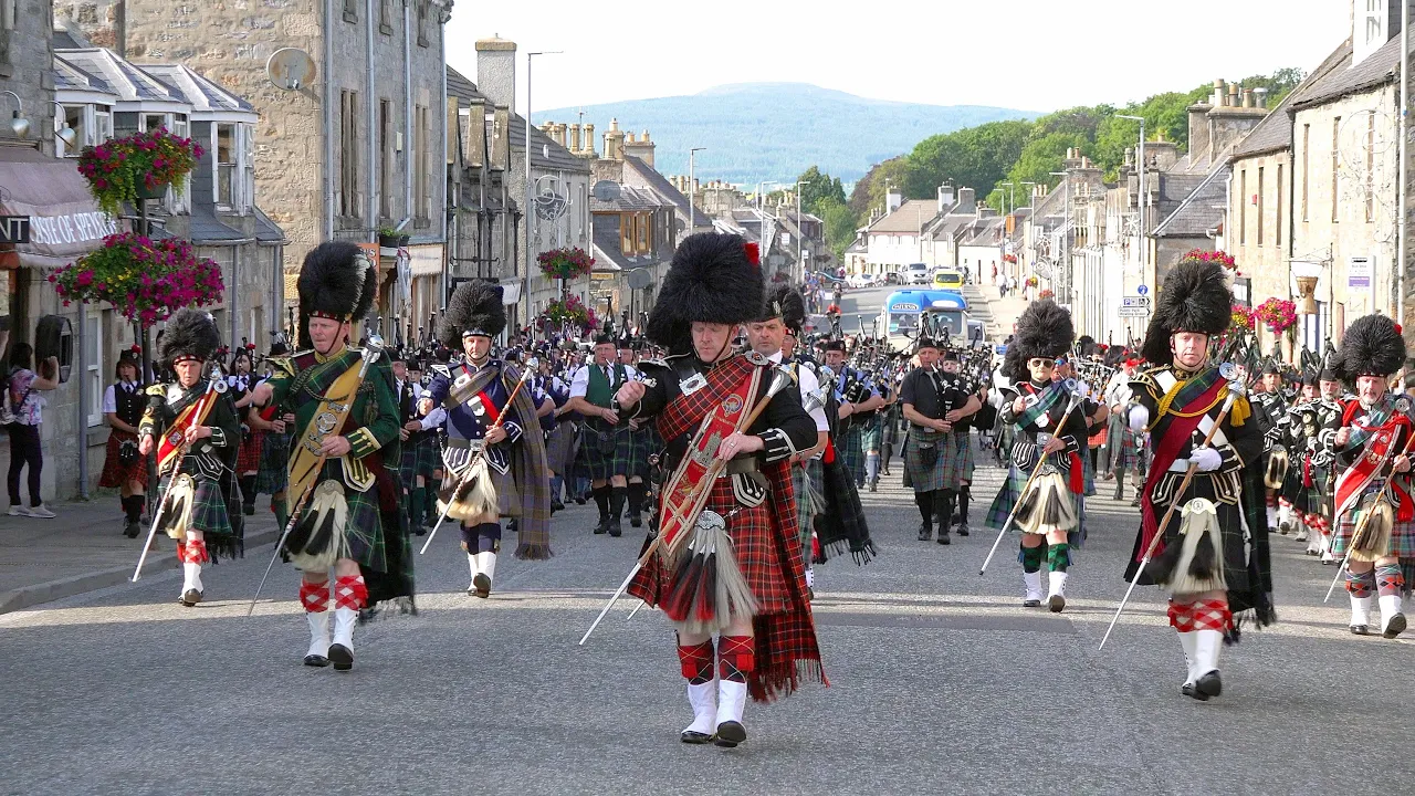 Scotland the Brave by the Massed Bands on the march after the 2019 Dufftown Highland Games in Moray Scotland the Brave by the Massed Bands on the march after the 2019 Dufftown Highland Games in Moray