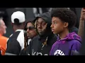 Lil Wayne at the Raiders vs Steelers NFL game with his son Kameron Carter